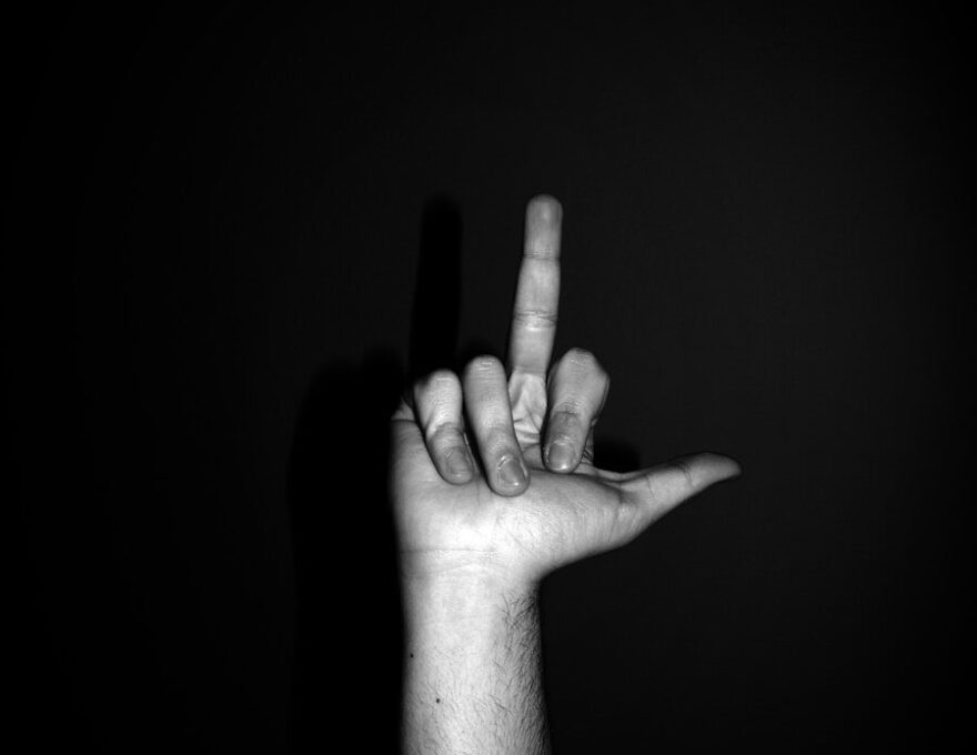 a hand with a black background