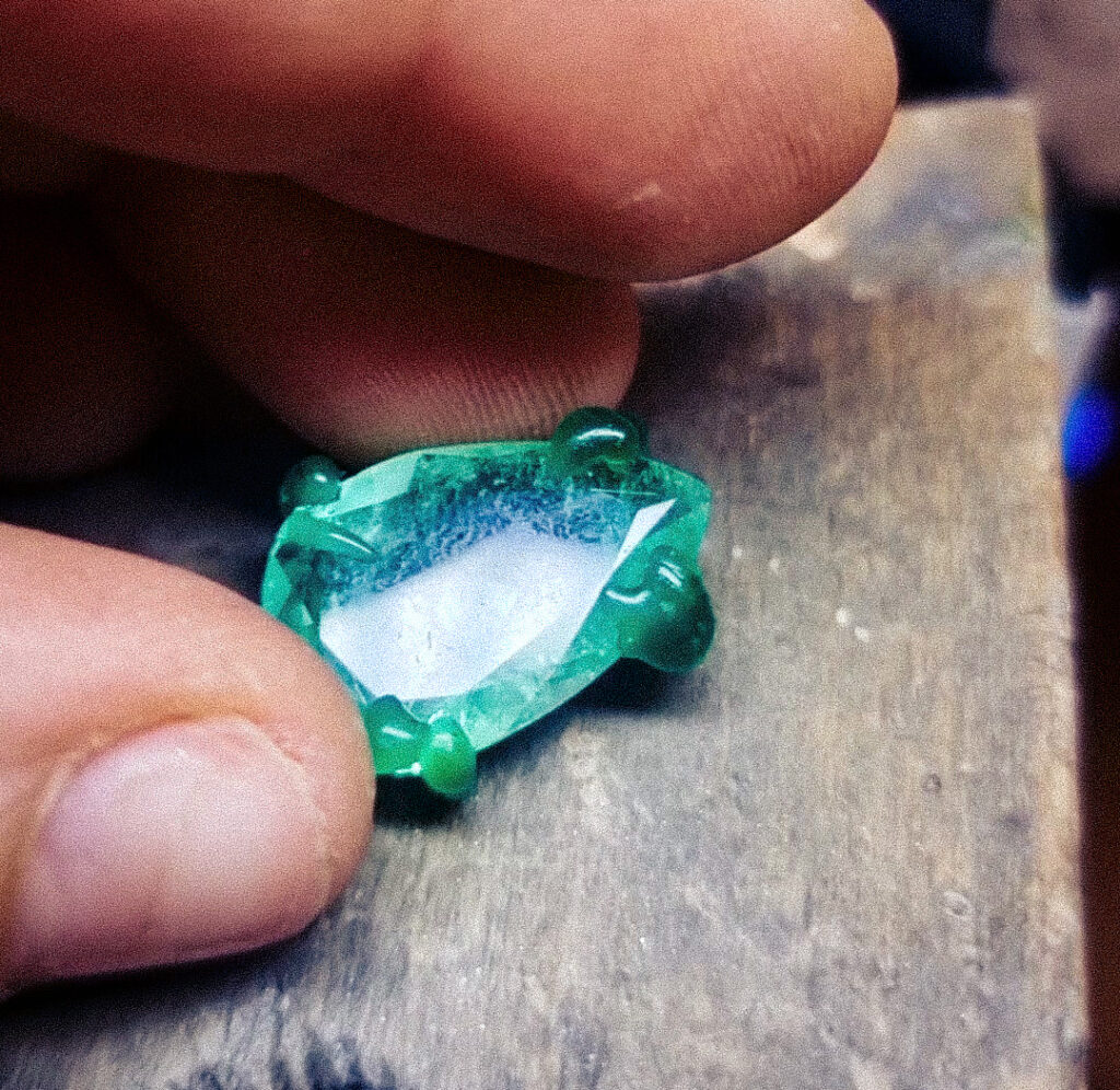 Emerald setting in wax