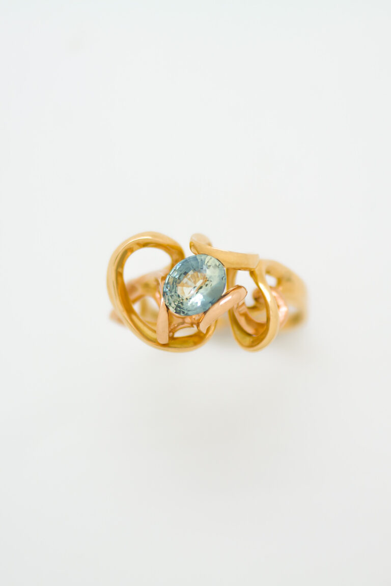 Close up of the ribosome ring with blue natural sapphire.