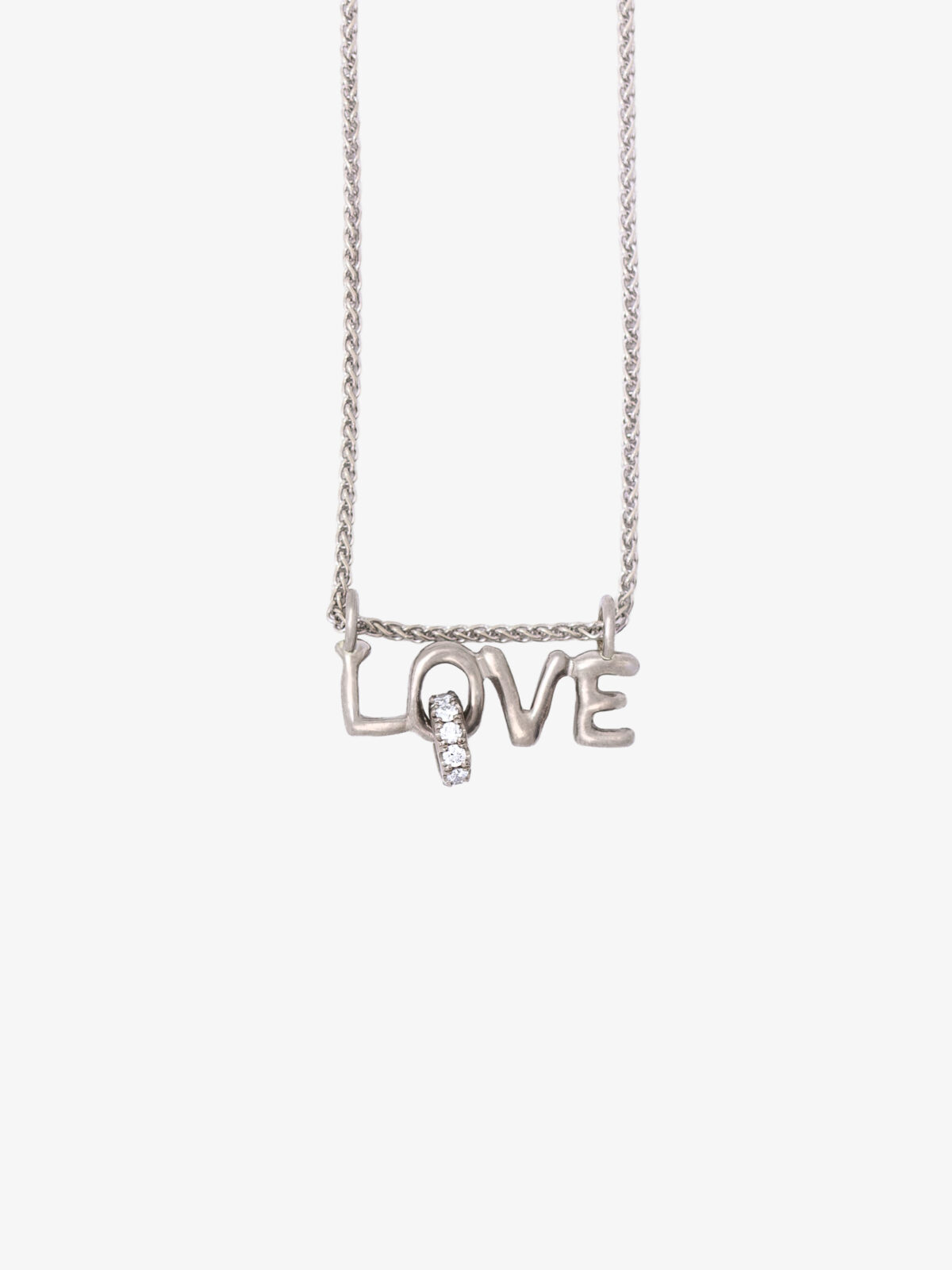 Detail photography of the 18 K White Gold Lettering Pendant Necklace on white background.